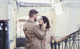 Fototapeta  - outdoor fashion portrait of young sensual couple in city. love and kiss