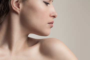 natural beauty concept young woman profile face closeup studio shot