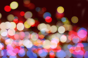 Wall Mural - Abstract colorful bokeh and blurred reflection lighting on black background.
