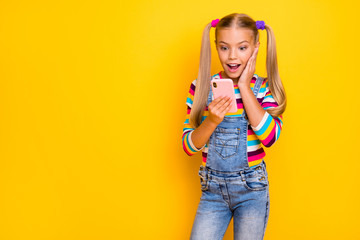 Sticker - Omg new followers. Crazy energetic kid addicted blogger use smartphone read social media news impressed scream wear striped sweater jumper denim jeans isolated bright shine color background