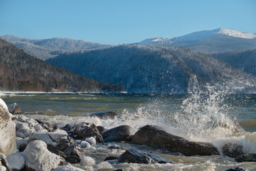 Wall Mural - Russia. South Of Western Siberia, Altai Mountains. Splashes of autumn storm on the shore of the unsettled Teletskoye lake.