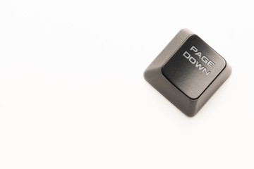 Poster - black keyboard button with a white inscription Page Down in the corner on a white background