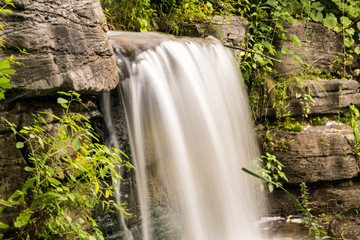 Wall Mural - close up of a long exposure waterfall photograph