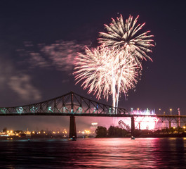 Wall Mural - Photograph of fireworks. Jacques Cartier bridge with fireworks. Montreal Quebec. Fireworks.