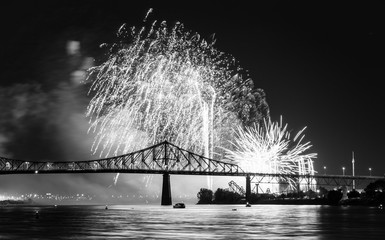 Wall Mural - Photograph of fireworks. Jacques Cartier bridge with fireworks. Montreal Quebec. Fireworks.