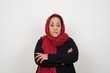 © Jihan - Isolated portrait of stylish young European woman bitting her mouth and looking worried and scared crossing arms, worry and doubt.