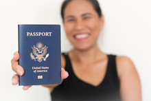 Proud New American Citizen Holding A US Passport. Immigration.