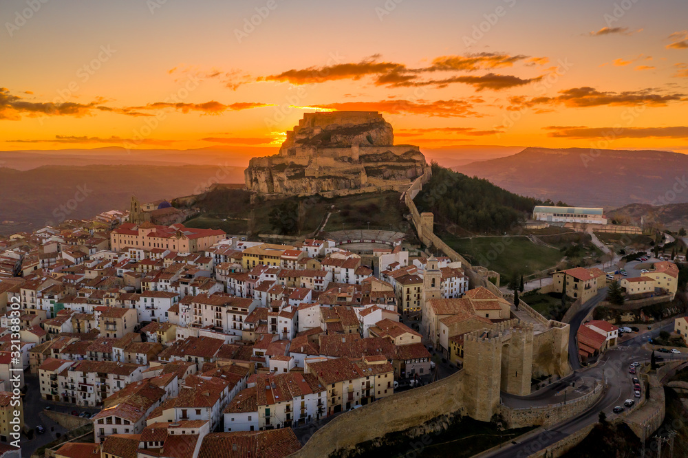 Sunset over medieval Morella walled town and fortress in Spain known for honey - obrazy, fototapety, plakaty 