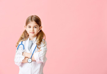 Canvas Print - Cute little doctor on color background