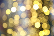 blurred golden circles of lights. defocused lights of festive garland