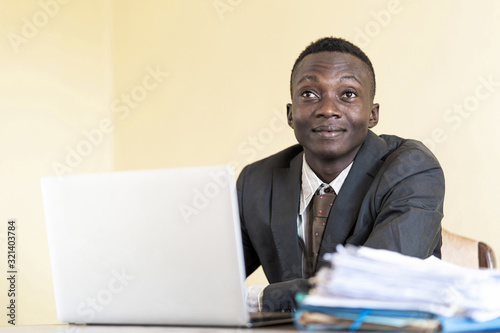 African clever businessman working worker busy looking up