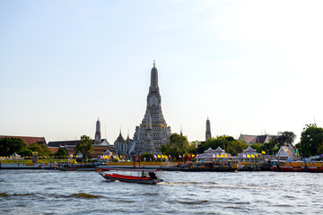 ‎Wat Arun Ratchawararam in the morning sky is a beautiful ancient temple built in the Ayutthaya it is where both domestic and international tourists are popular in Bangkok Thailand  January ‎29, ‎2020