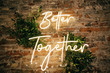 © Yevhenii Kukulka - Better Together - neon sign on a brick wall in a restaurant at a wedding party. Love concept