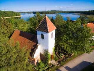 Wall Mural - Aerial view of Gothic style St. John the Baptist Church in Doba, Poland (former Doben, East Prussia)