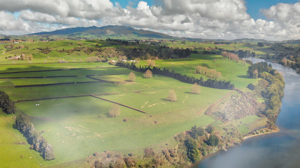 Wall Mural - Aerial view of amazing hills and river with a beautiful sky