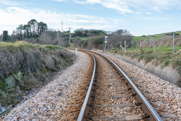 train track stretch in the town of ribadesella area, principality of asturias, northern spain