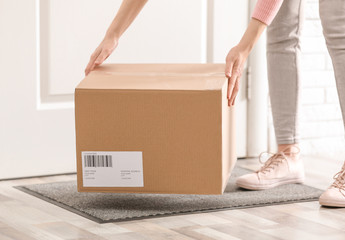 Poster - Woman taking parcel, closeup view. Delivery service