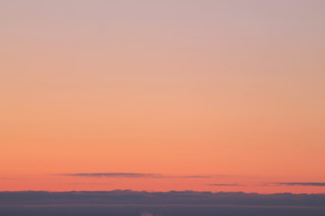 Wall Mural - a beautifully backlit colorful sunset sky with the colors of sunrise and sunset.