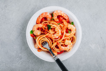 Italian food shrimp spaghetti pasta with tomato sauce