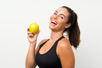 Wall Mural - Beautiful young girl with an apple