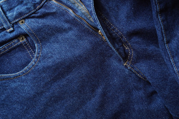 Jeans background. Denim jeans texture. Blue denim pattern.