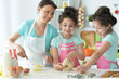 © aletia2011 - Cute girls baking in the kitchen at home