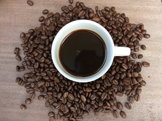 coffee beans on wooden background