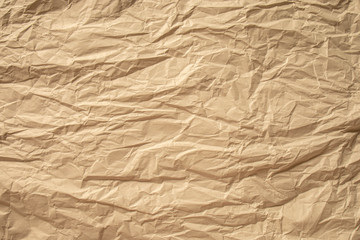 Brown crumpled paper close up texture background