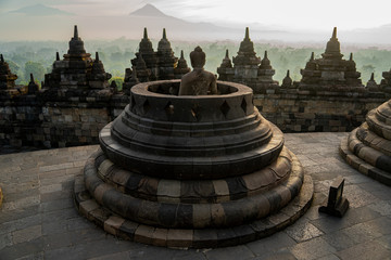 the biggest Buddhist temple in the world. Borobodur temple during sunrise with stunning colours and many stupas located close to Yogyakarta on Java, Indonesia