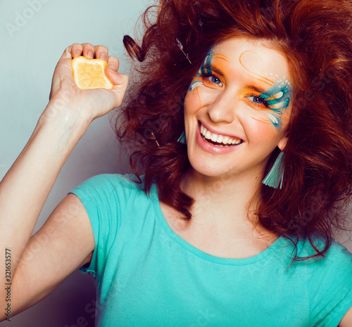 Cuadros en Lienzo pretty funny girl with art creative make up, closeup floral print on face, beaut