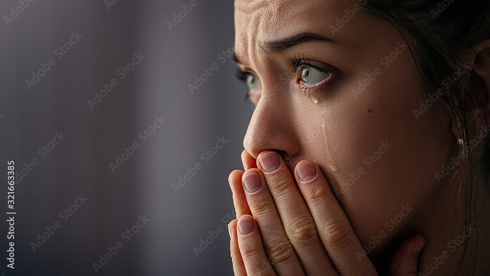 Sad unhappy grieving crying woman with tears eyes closeup - obrazy, fototapety, plakaty 