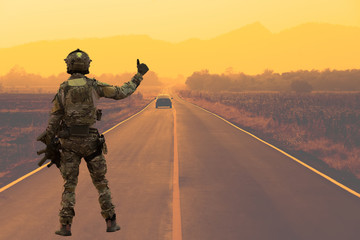 Wall Mural - Soldier with machine gun patrolling 