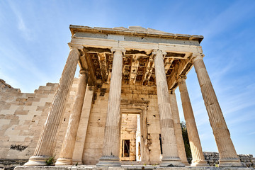 Wall Mural - ATHENS, GREECE - 2019 May 18: Tourists in ancient ruins Parthenon Temple in a summer day in Acropolis Greece, Athens