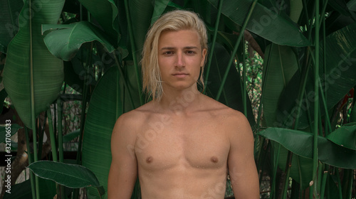Cuadros en Lienzo portrait men in jungle, surfer style mowgli