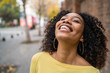 © Mego-studio - Portrait of Afro-american woman laughing.