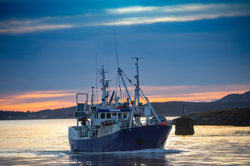 Fishingboat Fyrholm through Brønnøysundet, Nordland county (FYRHOLM is a Fishing Vessel that was built in 1965 )