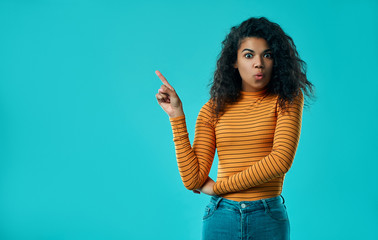 African american woman isolated on blue background.