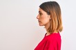 © Krakenimages.com - Beautiful redhead woman wearing casual red t-shirt over isolated background looking to side, relax profile pose with natural face with confident smile.