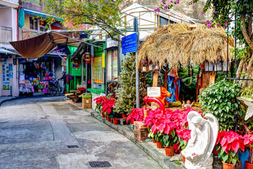 Street vendors in Tai O fishing village on Lantau Island in Hong Kong. 