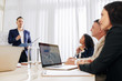 © DragonImages - Entrepreneur presenting his innovative idea to investors at meeting in office