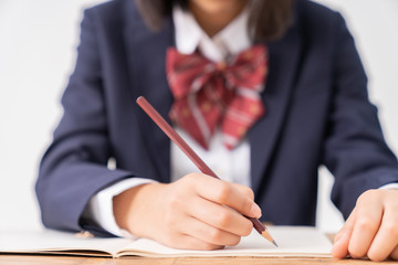 Wall Mural - 勉強する女の子　制服　ボディーパーツ　手元