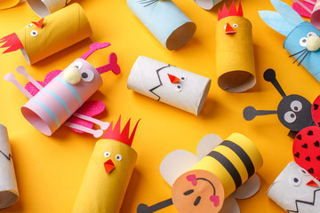 Wall Mural - Happy easter kindergarten decoration concept - rabbit, chicken, egg, bee from toilet paper roll tube. Simple diy creative idea. Eco-friendly reuse recycle decor, daycare paper craft