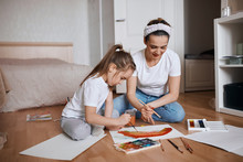 Woman And Attractive Cute Kid Learning To Colour Rainbow, Learning Colours. Close Up Photo. Girl Going To Be A Painter, Artist, Talent Concept