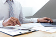 © Puwasit Inyavileart - Businessmen use graphs to summarize results and calculate income-expenses to find financial balance points and use them to improve and advance business, finance and economic concepts.