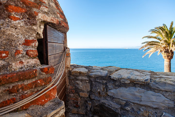 Wall Mural - The blue water of Ligurian Sea, seen from Camogli, a small fisherman village on the shores of the Ligurian Sea. (Northern Italy)