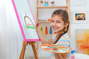 Poster - Cute little child painting during lesson in room