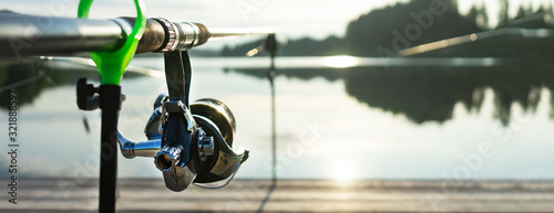 Fotografía Carp fishing on beautiful blue lake with carp rods and rod pods in the summer morning