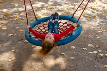 Girl Riding A Swing - Basket
