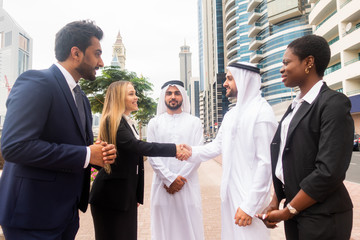 Wall Mural - Group of businessmen in Dubai