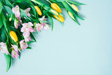 Wall Mural - Blue background with spring flowers, festive composition for spring holidays